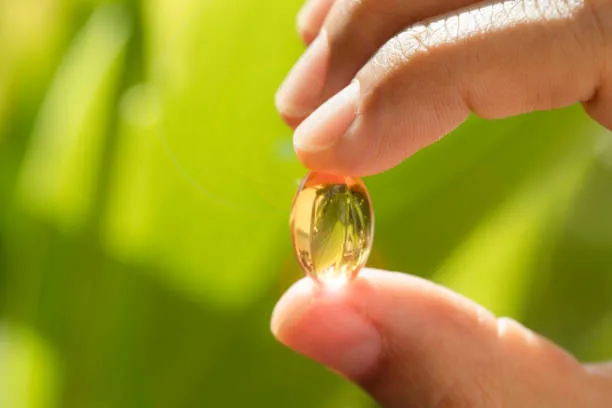 Alt Text: D-Alpha Tocopherol Vitamin E oil for softgel dietary supplement manufacturing.