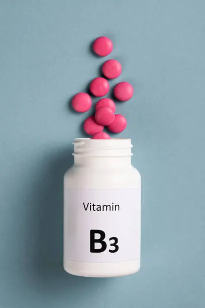 Vitamin B3 Nicotinamide tablets illustrating nutraceutical supplement applications.