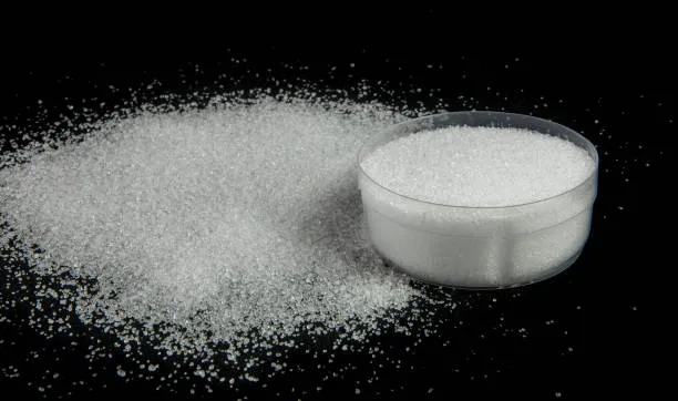 White crystalline Trisodium Citrate Dihydrate E331 powder for food and beverage manufacturing.
